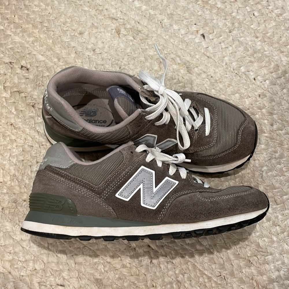 Style 574 New Balance gray and white tennis shoes size 9.